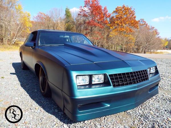 DRAGGIN STYLE CUSTOMS' 1984 MONTE CARLO SS IN SWAMP LAND GREEN PEARL